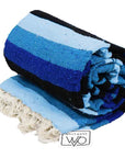 Blue and White Mexican blanket rolled up