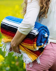 Rolled up Mexican yoga blanket - bright blue