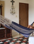 Indoor hammock hung in bedroom