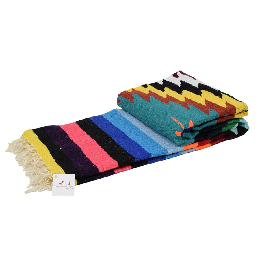 Colourful folded Mexican blanket for bedspread or picnic