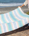 Light pastel toned Mexican falsa rug