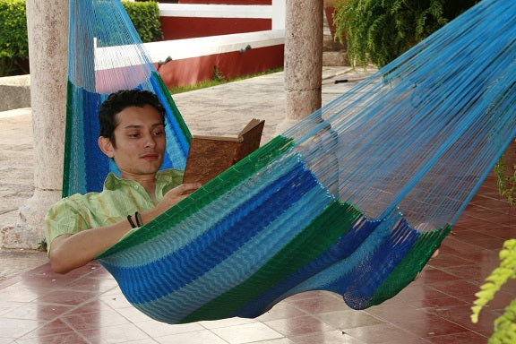 Relaxing in a hammock with a book