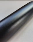 Metal black paint finish closeup
