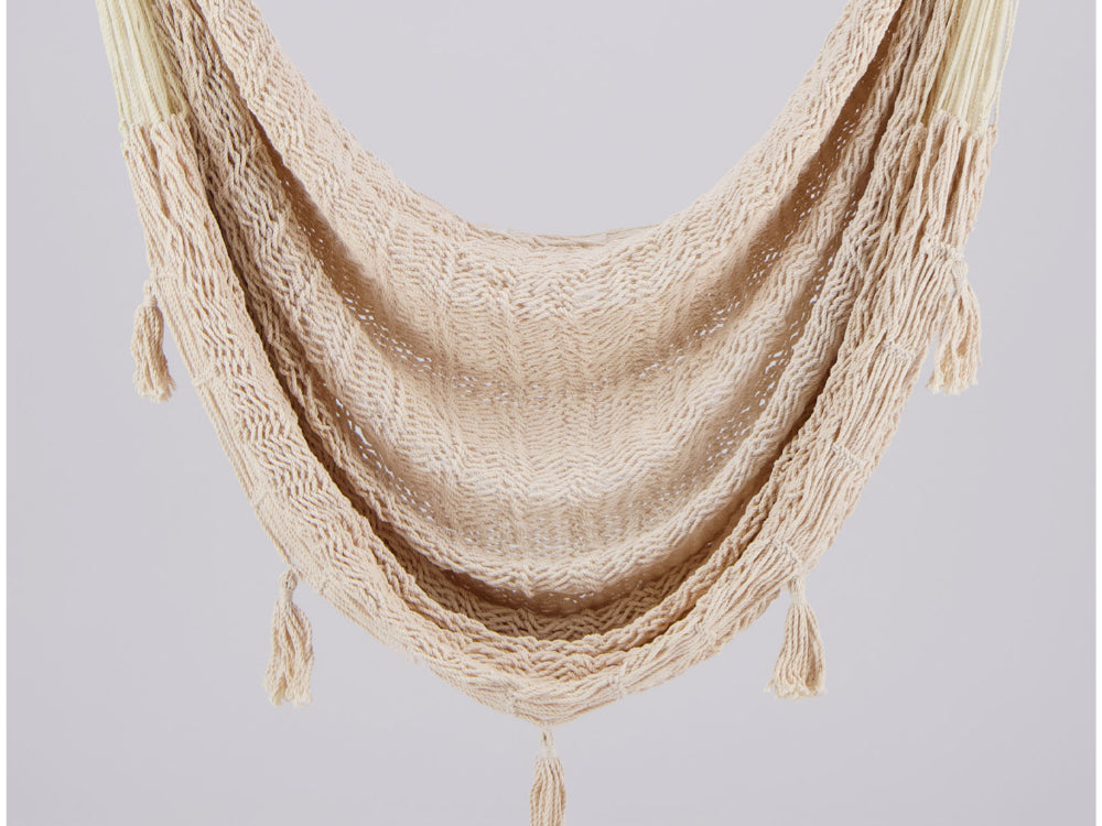 Natural white woven hammock with tassels