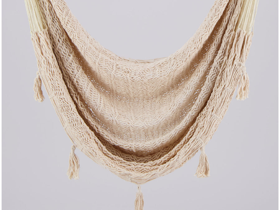 Natural white woven hammock with tassels