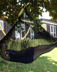 Women lying in XL size Mexican chair hammock