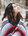 Mexican winter blanket used as warmth in snow