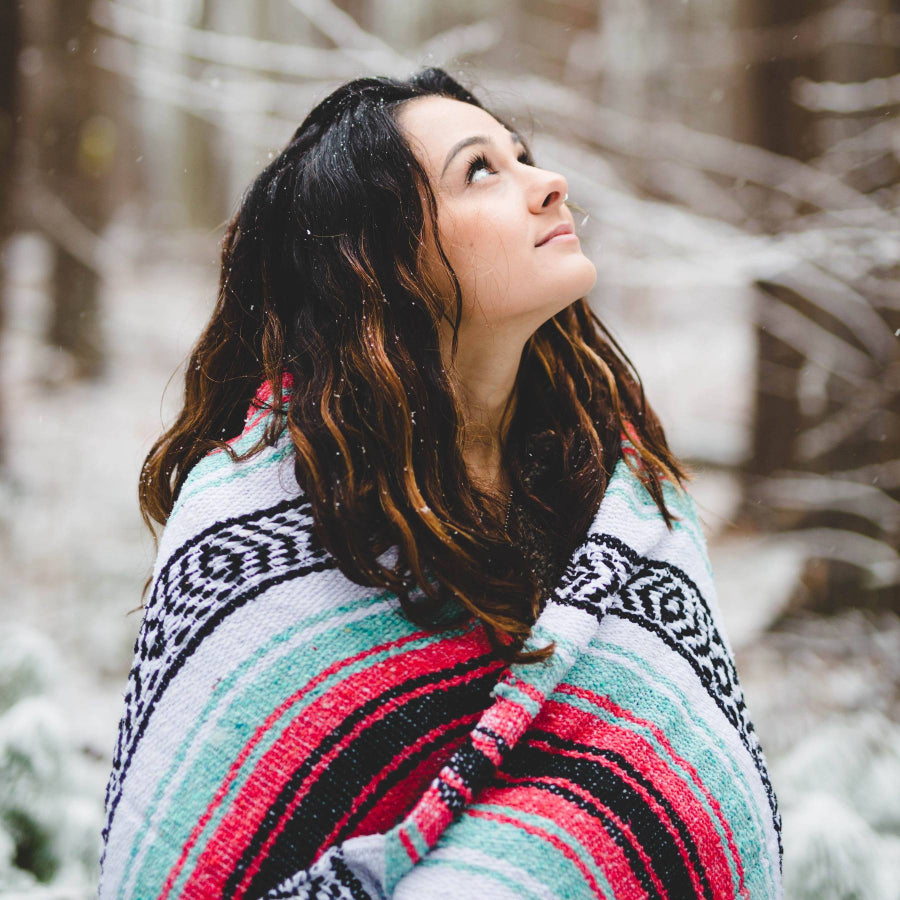 Mexican winter blanket used as warmth in snow