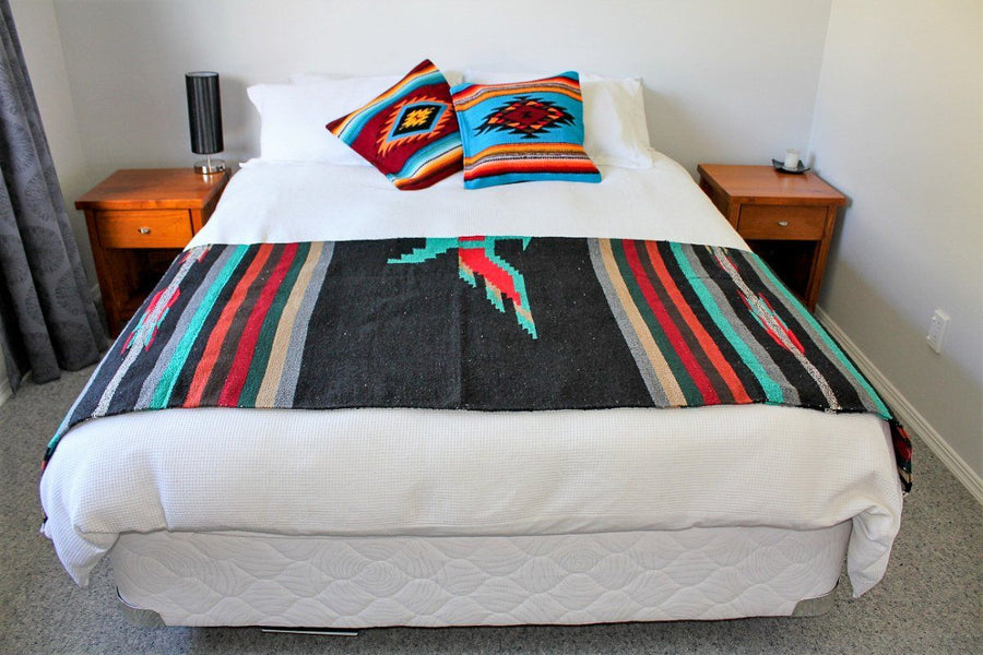 Mexican Blanket half folded on bed