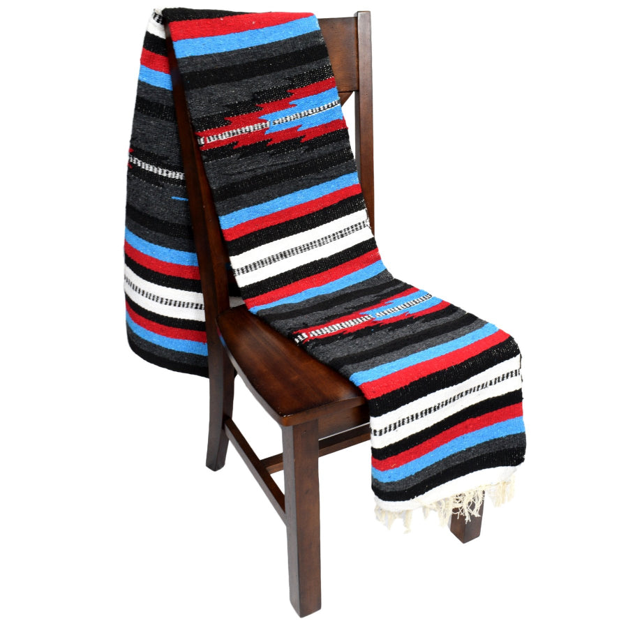 Diamond and striped Mexican blanket on chair