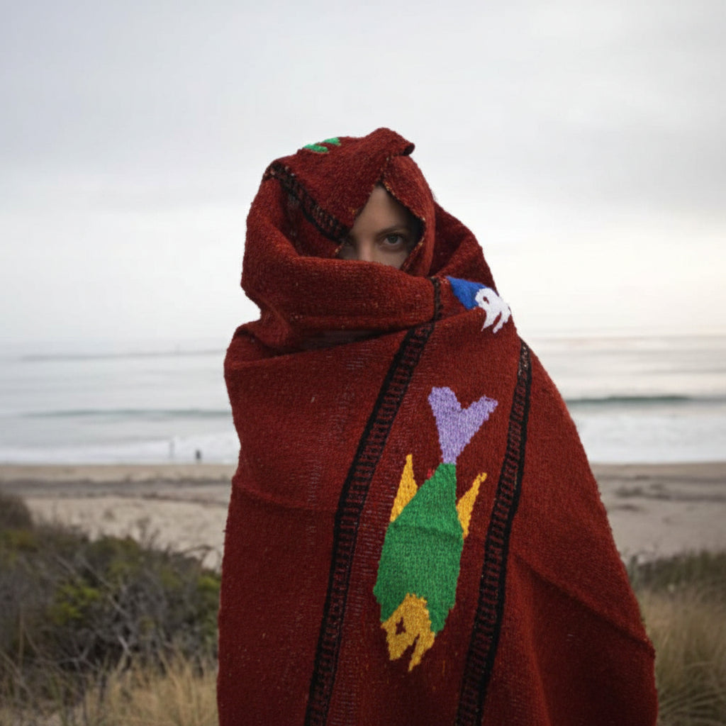 Women wrapped in Mexican blanket - fish design