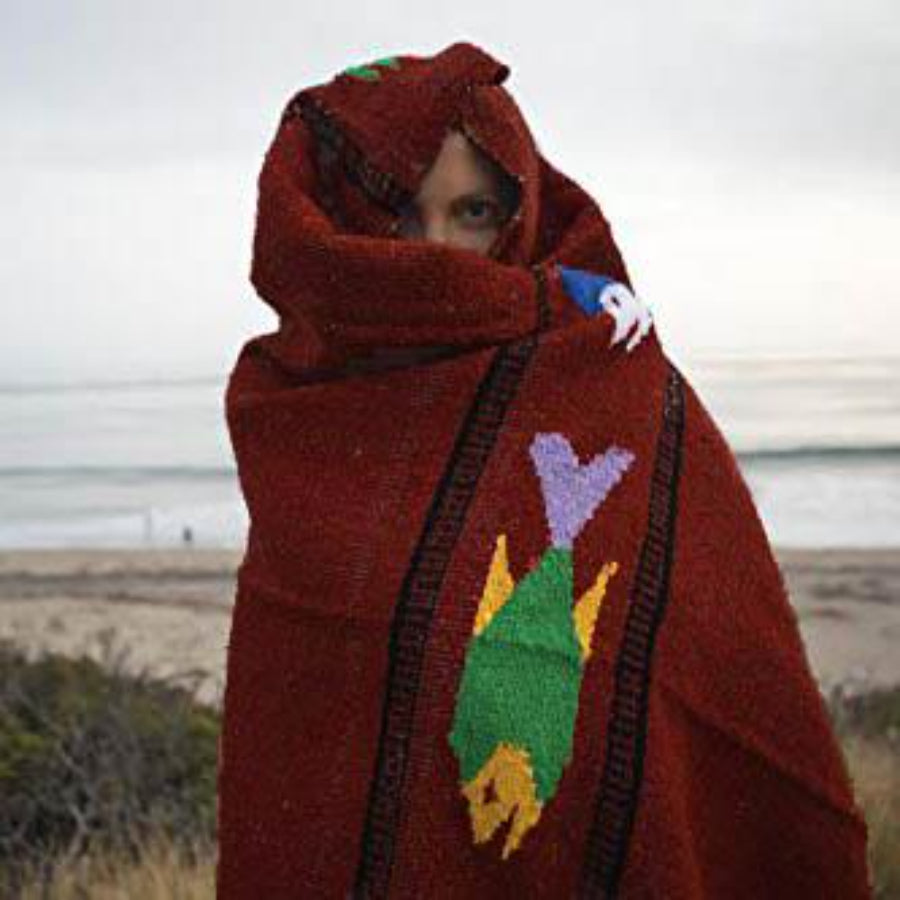Women wrapped in Mexican blanket - fish design