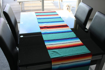 Green table runner - colour Mexican style on glass table