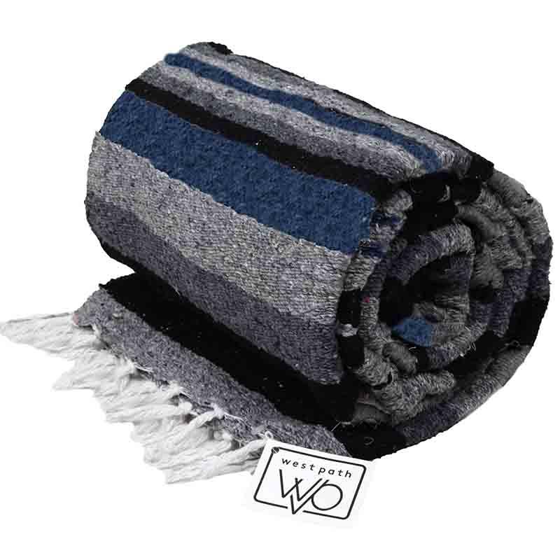 Rolled up Mexican blanket