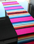 Table runner on black glass table