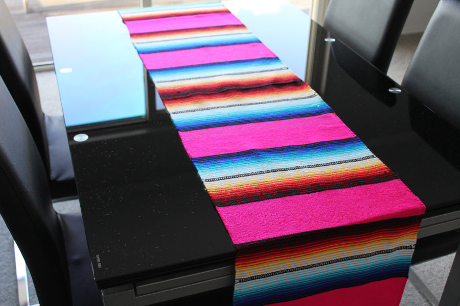 Table runner on black glass table